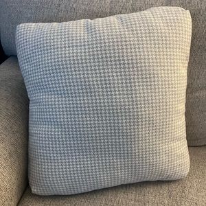 2 beige herringbone throw pillows